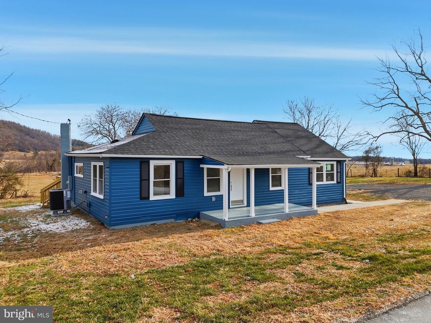 This newly renovated 3-bed, 2-bath home in Madison County makes it easy to picture your life here, waking up to panoramic mountain views, sipping coffee on your deck, and coming back to a space that feels warm and effortless. Inside, the granite countertops and luxury vinyl plank flooring throughout add a clean, modern feel that’s both beautiful and practical for everyday living. The open layout provides you with ample space to breathe, relax, and make the home your own from the very start. With a new roof, HVAC, appliances, insulation, deck, sidewalk, doors, and flooring. This beautiful home features spacious rooms and incredible views right outside your door. This is the kind of place where settling in feels natural.