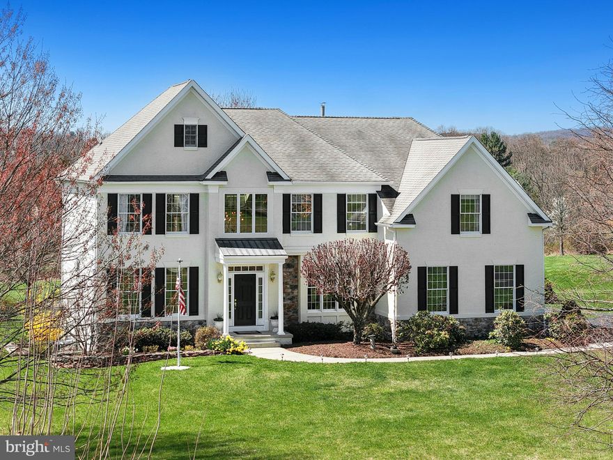 OPEN HOUSE - SUNDAY, APRIL 19TH - 11AM-1PM
COUNTRYSIDE DRIVE
    Located on over three acres on a quiet cul-de-sac in Durham Township, this pristine colonial has been thoughtfully designed and lovingly cared for.
   Soaring ceilings and an abundance of windows bring in ample natural light. Generously sized living and dining rooms have a classic feel, while French doors lead to an ideal home office. The kitchen is outfitted with wood cabinets, marble countertops, stainless appliances and ample storage and prep space. The two-story family room has a fireplace with marble mantel and pellet insert for efficient heating in winter months, flanked by tall  windows overlooking the spacious backyard. 
    Front and back stairs lead to the second floor, where the primary suite offers a tray ceiling and dual walk-in closets. The elegant primary bath features a walk-in shower, whirlpool tub and double vanities. Sunny and bright, three additional bedrooms on this floor share an updated hall bath. The walkout lower level is unfinished but offers high ceilings and lots of potential.  An attached 2-car garage is joined by a heated detached garage with space for 4+ vehicles.
     Outside, the composite deck leads down to the lush backyard with room to run. With easy access to commuter routes, shopping, dining and entertainment are in close proximity. Countryside Drive is a timeless home offering modern amenities in a quiet country setting.