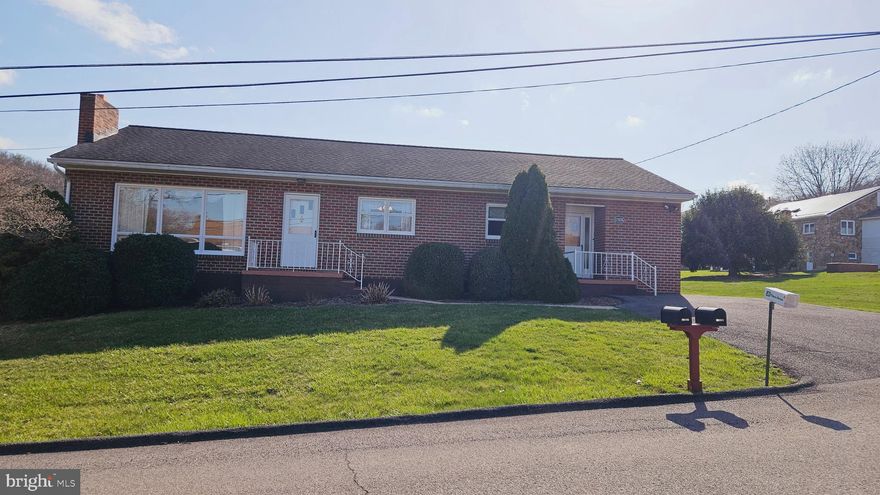 LOCATION, LOCATION, LOCATION!!  Back your bags, this move in ready brick ranch situated on .30 acre level  lot just outside city limits!  Main level consist of three bedrooms, 1.5 baths, kitchen with separate dinning room, plus spacious living room!  On a cold or chili day,  you can enjoy the warmth of the fireplace with a wood burner insert in the living room.  Wall to Wall carpet with wood floor under carpet, pictures of floors is located on the kitchen counter.   Also, on the main level is a sitting room or turn it into a mud room that flow out to the enclosed sun room.   The sun room allows  you the opportunity to  enjoy the feeling of being outdoors year round!  Off of the sun room is a deck for your grill and other patio furnishings!  In the lower level you have a nice size recreation room, laundry, plus garage, and plenty of storage!