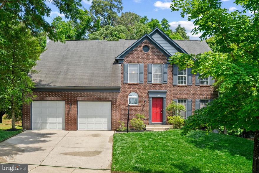 Stunning 5-bedroom, 3.5-bathroom colonial nestled in an unbeatable location! This home boasts elegant granite countertops, a spacious kitchen island, and gleaming hardwood & ceramic floors throughout. Enjoy the warmth of two cozy fireplaces and entertain guests in the formal dining and living areas adorned with graceful columns. Retreat to the luxurious master bedroom featuring cathedral ceilings and indulge in relaxation with a soak-in tub under skylights and a separate shower. The fully finished basement offers a large recreation room with a wet bar. Step outside to a sizable deck overlooking a tree lined backyard, perfect for outdoor gatherings. Park with ease in the two-car garage and appreciate the fresh appeal of New Carpet, New Stainless Steel Appliances, and a charming brick front. Experience refined living with thoughtful cosmetic updates throughout your new home including fresh paint and refurbished deck. HOME WARRANTY included.