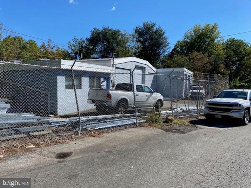 The site contains a land area of approximately 17,800 SF with 166.00 feet of frontage along Beech Street between George and Kohn Streets. One-story, concrete block and frame, office-warehouse building
with 7,795 SF, of which 28.3% is finished office space. The subject site is improved with a light industrial building as well as site improvements. The office section includes front entry and office area, two rest rooms, private office with drafting table, file room, kitchenette, bathroom with stall shower, reception area, hallway to a conference room, and three private offices. The warehouse section includes receiving area, warehouse storage divided into two sections with a wood frame mezzanine level along the 
southeastern building elevation and has three drive-in doors. Office Area: 2,203 SF Warehouse Area: 5,592 SF