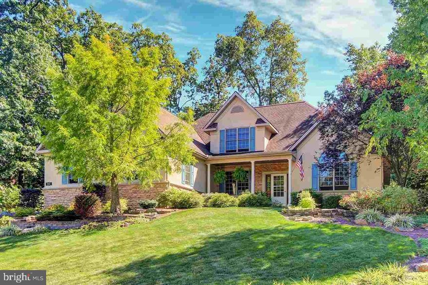 Gorgeous custom built Jeff Henry built home-lst floor master suite with tray ceiling,luxurious bath-Open floor plan with 2 story family room-Custom Weir kit with granite, SS appliances,cherry cabinets,DA and bkfst area-multilevel Trex deck with retractable awning-Private paradise awaits in your own back yard-waterfall,pond,park-like setting-Den, rec room and workshop in lower level-gleaming hardwood floors-ceramic tile baths-YOU WILL LOVE IT!