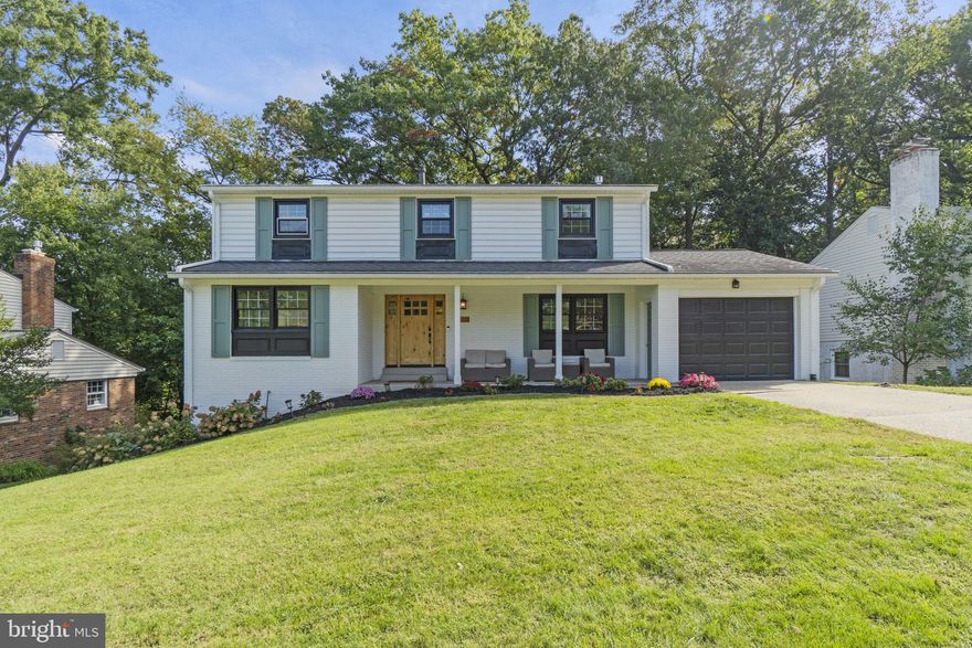 Nestled in the sought-after Wilton Woods community of Alexandria, this exceptional 5-bedroom, 3.5-bathroom single-family home is a sanctuary of style and comfort. Boasting over 3000 square feet, across three meticulously finished levels, this residence is a testament to good taste and modern functionality. The moment you step inside, you'll be captivated by the attention to detail and modern upgrades. From the flooring to the fixtures and all of the little details in between, this home has been thoughtfully refreshed to cater to modern lifestyle.  
The kitchen is adorned with pristine white quartz countertops, complemented by sleek stainless steel appliances and a peninsula bar.  The walk-in pantry & laundry room  expand your counter space and storage options keeping all of the unnecessary clutter out of your way. 
For those who relish entertaining, the dining room off of the kitchen is a true gem, showcasing a floor-to-ceiling brick, wood-burning fireplace. The formal parlor and living rooms on the front of the home are versatile spaces and further amplify the grandeur of this residence.
The 20x10 four-season room off of the kitchen provides panoramic views of the lush surrounding trees. It's an ideal space for morning coffee or as a serene reading nook.

The walk-out level basement, finished in 2020, is adorned with high-end finishes and is a true highlight of the home. It features a stunning new bathroom, a recreation room complete with a bar and a cozy gas fireplace, creating an inviting space for gatherings and relaxation. With its own full bath, the fifth bedroom on this level offers privacy for guests or a home office. Luxury vinyl plank flooring throughout adds a touch of elegance.

Situated on a premium lot that backs to a serene wooded area, privacy is truly paramount. Step onto the slate stone covered patio, and you'll instantly fall in love with your outdoor space. The backyard is a custom-designed oasis, astro turf for low-maintenance greenery, extensive hardscaping, retaining walls and a French drain system for worry-free living. The covered patio invites al fresco dining and relaxation, creating the perfect outdoor retreat. The privacy fence creates an intimate atmosphere for relaxation and play. It's a perfect canvas for your landscaping dreams.

Conveniently located just minutes away from Old Town Alexandria, Kingstowne, and Springfield Town Centers, and in close proximity to I-95/495/395 and the Huntington Metro station!