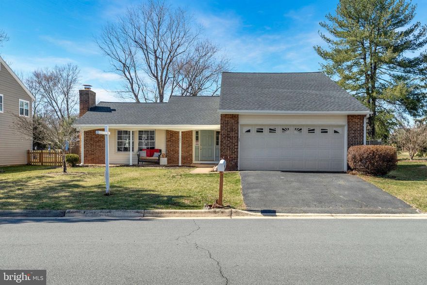Main-Level Living at its best!  Welcome to this spacious and open 4-bedroom, 3-bath home in the highly sought-after Sugarland Run community! Designed for main level living, this home is filled with natural light and character, featuring a ceiling-high brick fireplace and vaulted ceilings that create a dramatic and inviting entry.  The updated open kitchen is a chef’s dream, boasting stainless steel appliances and all the counter space you could need—perfect for entertaining! Upstairs, a large sun-filled room  with a full bath offers endless possibilities as a 4th bedroom, home office, or playroom. The fenced backyard with a patio backs to a park with a playground and access to the walking trail. The attached 2-car garage includes built in storage and a workbench. This home is truly move in ready! 
This home is just steps from community trails and a nearby creek. Sugarland Run offers 26+ miles of walking and biking paths, an outdoor pool with a local swim team, a lake for fishing, multiple playgrounds, a community center, and courts for tennis, volleyball, basketball, and baseball. Enjoy easy access to Rt. 7, with many shopping and dining options nearby, including quick access to Dulles Airport and metro train and bus stations.  New Architectural Roof and New Vinyl siding installed 11/24.