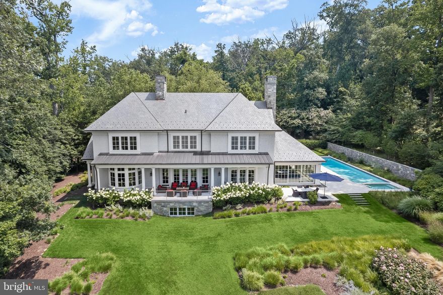 Welcome to 630 Magothy Road! Built in 2014, this spectacular home is a stunning Gibson Island waterfront shingle style house on the Magothy River representing the finest combination of amenities for a buyer who desires a high-end, turn-key, luxury home. Situated on a 2.46 acre wooded private lot with sweeping views of the Magothy River and the southwest sky with its resplendent sunsets, this masterpiece was designed by Vincent Greene Architects and built by Pyramid Builders, considered the region’s top builder of distinctive homes.  
 
With an open floor plan perfectly suited for today’s living and entertainment needs, this magnificent property offers breath-taking water views from virtually every room. With 8000 square feet of finished space, enter the main level through an inviting entry hallway to a generous living room with a wood burning fireplace and gorgeous waterfront views. A fabulous gourmet kitchen with ample dining space adjoins a family room, also with a wood burning fireplace.  Overlooking the large, 20 yard long, heated pool with spa and the Magothy River is a welcoming four-season loggia with two walls of glass, Loewen retractable sliding glass doors and uniquely designed retractable screens, a third wood burning fireplace and radiant heated floors. The main level offers two half baths, a laundry room, and attractive locker area by the pool. Built-in cabinetry for recreational equipment creates a functional, aesthetically pleasing area and activity entry point. 

Ascend the hand-crafted staircase to the upper level, with its tasteful landing overlooking the downstairs, where there are five en suite bedrooms, including a superb primary bedroom suite, a private office, and second laundry room. On the lower level is an exercise room with natural light, a potential sixth bedroom, full bath, and expansive unfinished space for additional living. Finishes and amenities include random-width, walnut floors, high ceilings on all levels, three fireplaces, laundry rooms on both the main and upper levels, a state-of-the-art, multi-zone, geothermal HVAC system, a 3-car, oversized garage, extensive hardscaping, an IPE porch overlooking the Magothy River with 200 feet of water frontage, a heated salt pool with automatic cover and heated spa, a dock with a new boat lift, a Cummins generator that runs two thirds of the house, a slate roof, expansive rear garden and lawn, irrigation system and outstanding finishes inside and out.   
  

 Information on Gibson Island--A private island within one hour of Washington, D.C., and Baltimore; absolutely extraordinary setting - 1000 acres with seven miles of shoreline, two thirds of land undeveloped and owned by the Gibson Island Corporation, one third residential home sites,  no need to cross the Bay Bridge - located on Western Shore of Maryland, 43-acre spring fed fresh water lake, enormous  privacy and security--entry gatehouse staffed 24+Hours and Gibson Island Police Force  (GIPD,)Gibson Island Corporation Service Department for homeowners offering yard maintenance and landscaping and other services, full service yacht yard, 20 minute drive to BWI, airport and train station, private country club (membership by invitation) offering yachting, fine dining year-round, tennis, award-winning Charles Blair Macdonald designed 9-hole golf course, swimming, croquet, skeet shooting, and more , private tours by appointment.  (C) Gibson Island Corporation, all rights reserved. Please view our video of this stupendous property.