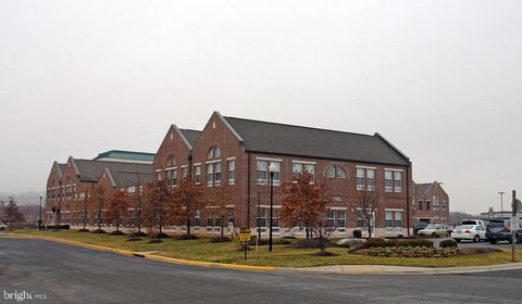 Photo of 21165 Whitfield Place #207, STERLING, VA 20165 (MLS # VALO2115926)