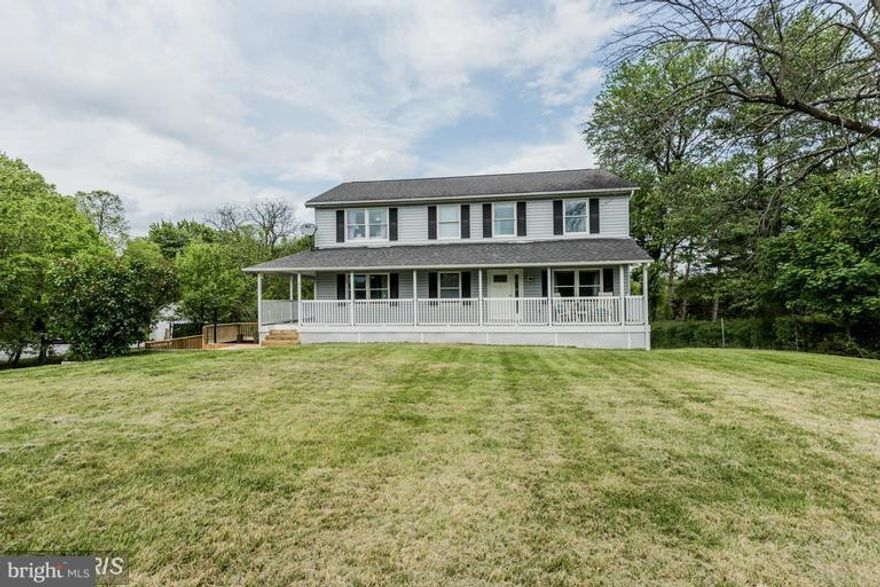 5 bedroom, 2 full 2 half baths, 2cG colonial style farmhouse in Ellicott City features a spacious and modern kitchen and breakfast room with custom 42  cabinets, energy star stainless appliances, granite, and built-in wine cooler; sep DR, loads of living space and open floor plan; main floor hardwoods; bay window(s); owner s suite w/ attached bath. In ground pool, pool house, brick patio.