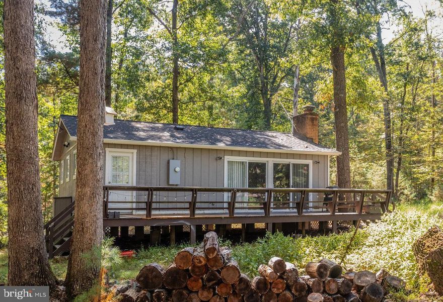 Welcome to 18060 Sundance Forest Rd, tucked away on a quiet mountain road, this charming 2-bedroom, 1-bathroom cabin offers the perfect escape from the everyday. Set on 5 private acres, you’ll find yourself surrounded by peaceful woods, fresh mountain air, and the kind of quiet that can only be found in nature.

Step inside to a cozy layout that’s ready for your personal touch. Imagine sipping your morning coffee on the porch as the sun peeks through the trees, spending afternoons exploring your land, and ending the day stargazing by a crackling fire. With plenty of space to roam, garden, or simply relax, this property invites you to slow down and enjoy mountain living at its best.

Conveniently located just minutes from Broadway, Harrisonburg, and Shenandoah National Park, you’ll have easy access to hiking, fishing, and all the adventures the Valley has to offer—while still enjoying the privacy of your own retreat.

This special cabin is being sold as-is, giving you the opportunity to create the mountain getaway you’ve always dreamed of.