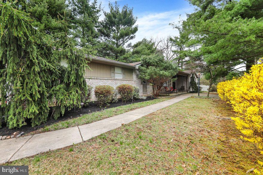 Welcome home to 5 Park Road, located in the desirable Wyomissing Area School District! This well maintained ranch style home offers three bedrooms with an additional fourth bedroom in the basement and three and a half bathrooms, along with a beautiful in ground pool perfect for relaxing and entertaining and a two car garage. As you enter the home, you are greeted by a cozy living room featuring a charming white brick fireplace. The kitchen has been thoughtfully updated with quality cabinets and granite countertops and includes a seating area, ample cabinet space, and hardwood flooring throughout. Just off the kitchen is a dining area with a new sliding glass doors that lead to the back patio and pool area, creating a seamless indoor outdoor flow. The primary bedroom with a great walk in closet offers a comfortable retreat with carpet and a ceiling fan, along with an updated en suite bathroom featuring a stunning stone shower and glass doors. Two additional generously sized bedrooms share a full hall bathroom, and a convenient half bath completes the main level. Downstairs, you’ll find a fully equipped in law suite with its own kitchen, highlighted by a large island with stool seating. This level also includes a living area, an entertainment area, a bedroom, and a beautifully updated full bathroom with modern black and white finishes. Additional basement storage space is also a great highlight of this lower level. Luxury vinyl flooring runs throughout this level. Step outside to your private backyard oasis, complete with a concrete patio and in ground pool perfect for relaxing or hosting guests. Conveniently located near local shopping, dining, and major highways. New HVAC system installed in 2022. Schedule your showing today!