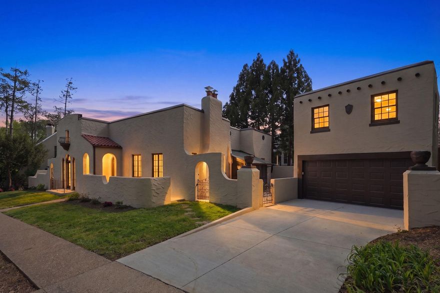 A rare find in the heart of Lyon Village.

Just two blocks from Clarendon Metro, this distinctive Spanish Mission style residence offers the wonderful blend of character, design and convenience.

This 1925 home is one of a kind which features stucco exterior, plaster walls, Pella windows, and solid block construction. Rich architectural details create a sense of warmth and distinction, including soaring ceilings, arched doorways, wrought iron gates, columns, French doors, and built-ins.

Outdoor spaces are equally inviting with a small screened seating area which opens to a private walled brick patio and a grilling terrace just off the kitchen.

The main level offers a livable layout with two bedrooms, two full baths, a powder room, along with a large office or family room off the kitchen.

Generous entertaining spaces include a gracious living room with a wood-burning fireplace, a formal dining room and a spacious modern kitchen designed for everyday comfort and effortless hosting.
A particularly special feature is the detached garage topped by a private guest suite, complete with a separate exterior entrance, bedroom, and full bath. This hard to find bonus space is ideal for guests, a secluded home office or an au pair suite.

The lower level adds more flexibility with a finished family room, laundry area, storage and utility space.
Two bedrooms and 2.5 bedrooms in the main house and an additional bedroom and full-bath with a separate entrance above the garage.

Full of charm, this is a truly special Lyon Village offering in one of Arlington’s most sought-after neighborhoods.