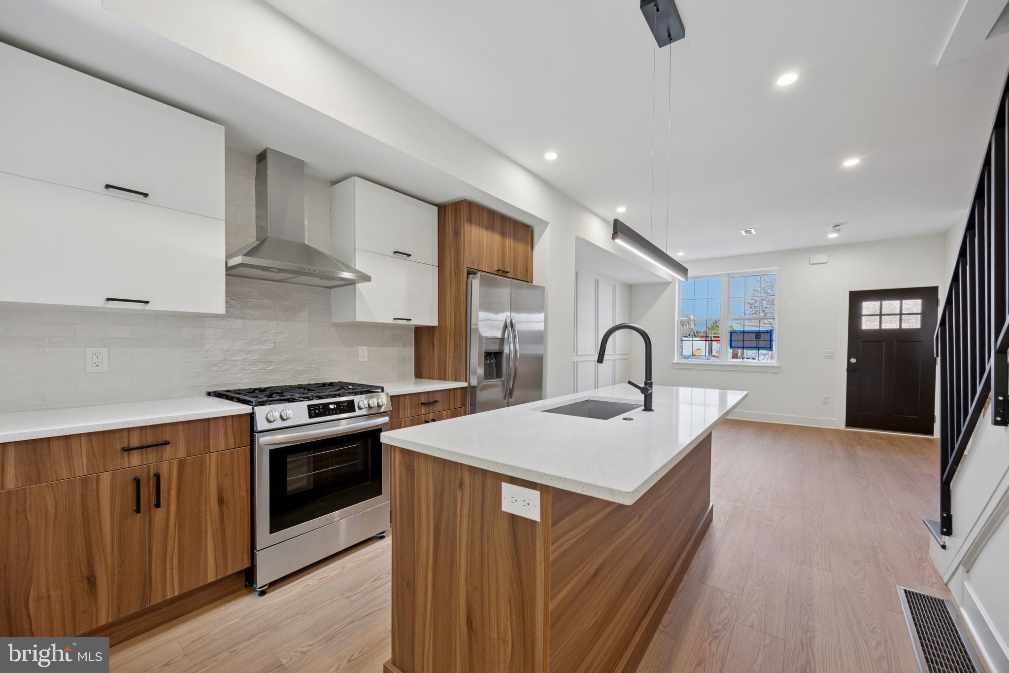 Brand New, Gut Renovated, Basically a New Construction House, that has Abetment from the City for 10 Years. Welcome to this luxurious home with a Large Private Outdoor Patio. Masterpiece with Accent walls, moldings and trimming throughout the home. Property has been completely transformed with top-to-bottom renovations, featuring brand-new plumbing, brand new electrical, brand new roof, brand new exterior, and sleek interior finishes. Every detail has been thoughtfully curated for modern living, boasting high-end fixtures, elegant flooring, and designer touches throughout. The open-concept layout on the first floor is bright and airy, with Large Living Room as you walk in followed by a stunning custom kitchen and then a private Dining Area that looks out to your Private Patio. High ceilings, and oversized windows that flood the space with natural light. The primary Master Bedroom features an on suite bathroom.