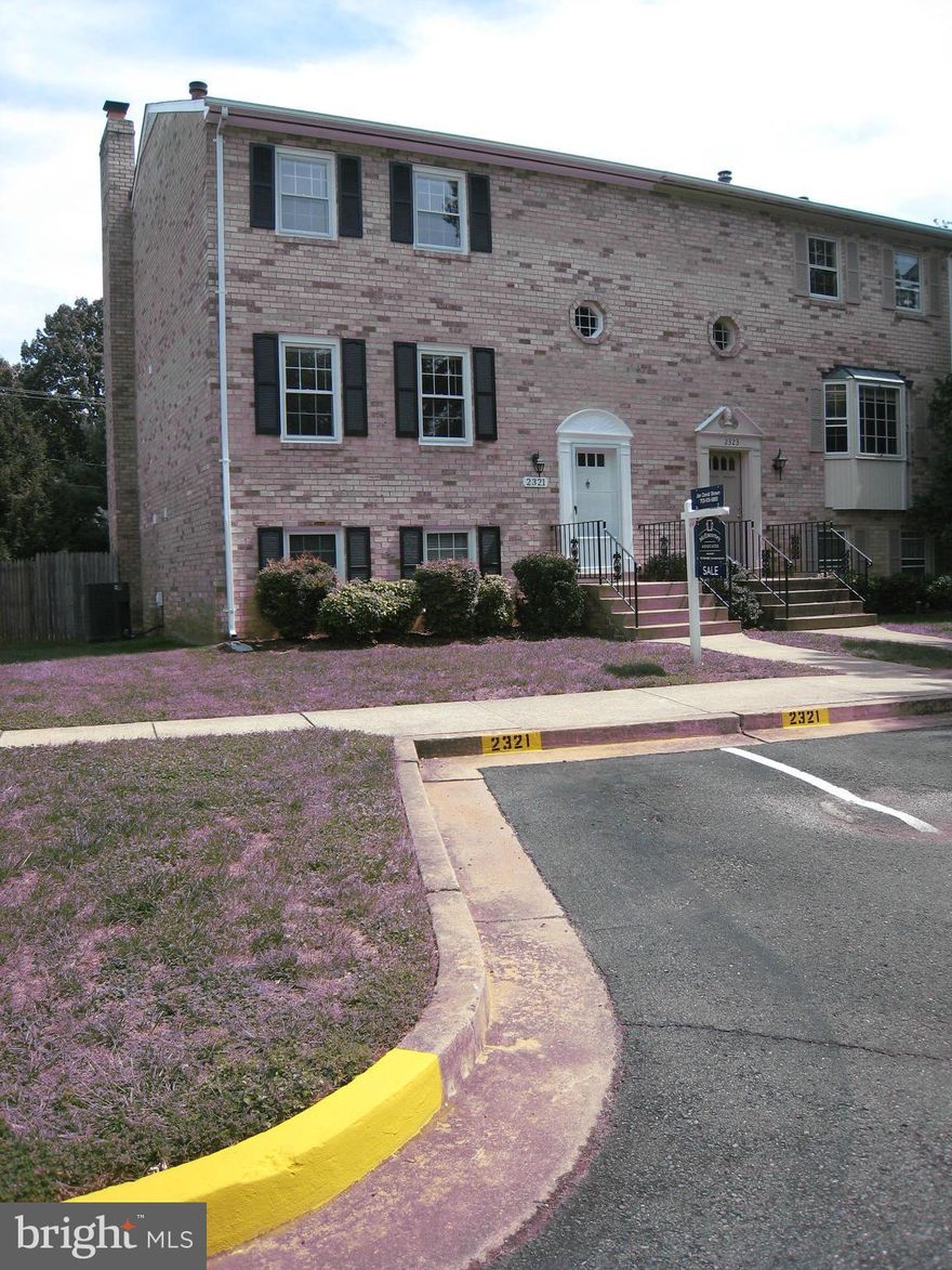 OPEN SUN 1-3 Renovations just completed! Total high end renovation throughout! All new kitchen & baths! Granite, ceramic and SS. Large master with 2 huge closets one walk in. Recessed lights, hardwood top two floors, fireplace in spacious family room that has walkout to patio. End unit w/large yard.  Beautiful well kept neighborhood of all brick townhomes. Close to Tyson's & Dunn Loring metros.