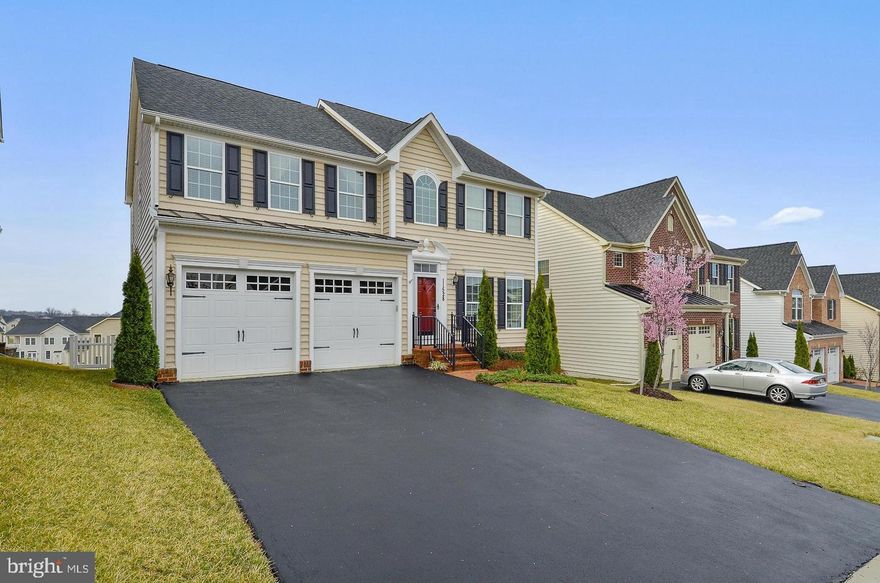 Beautiful home in Clarksburg Village.  4 bedrooms - 3 and one-half baths!  Hardwood floors on the main and upper levels.  Center island kitchen, and granite countertops.  Family room leads to a large custom composite deck overlooking a nice large lot!  Fully finished basement with full bath!  Very gently lived in!