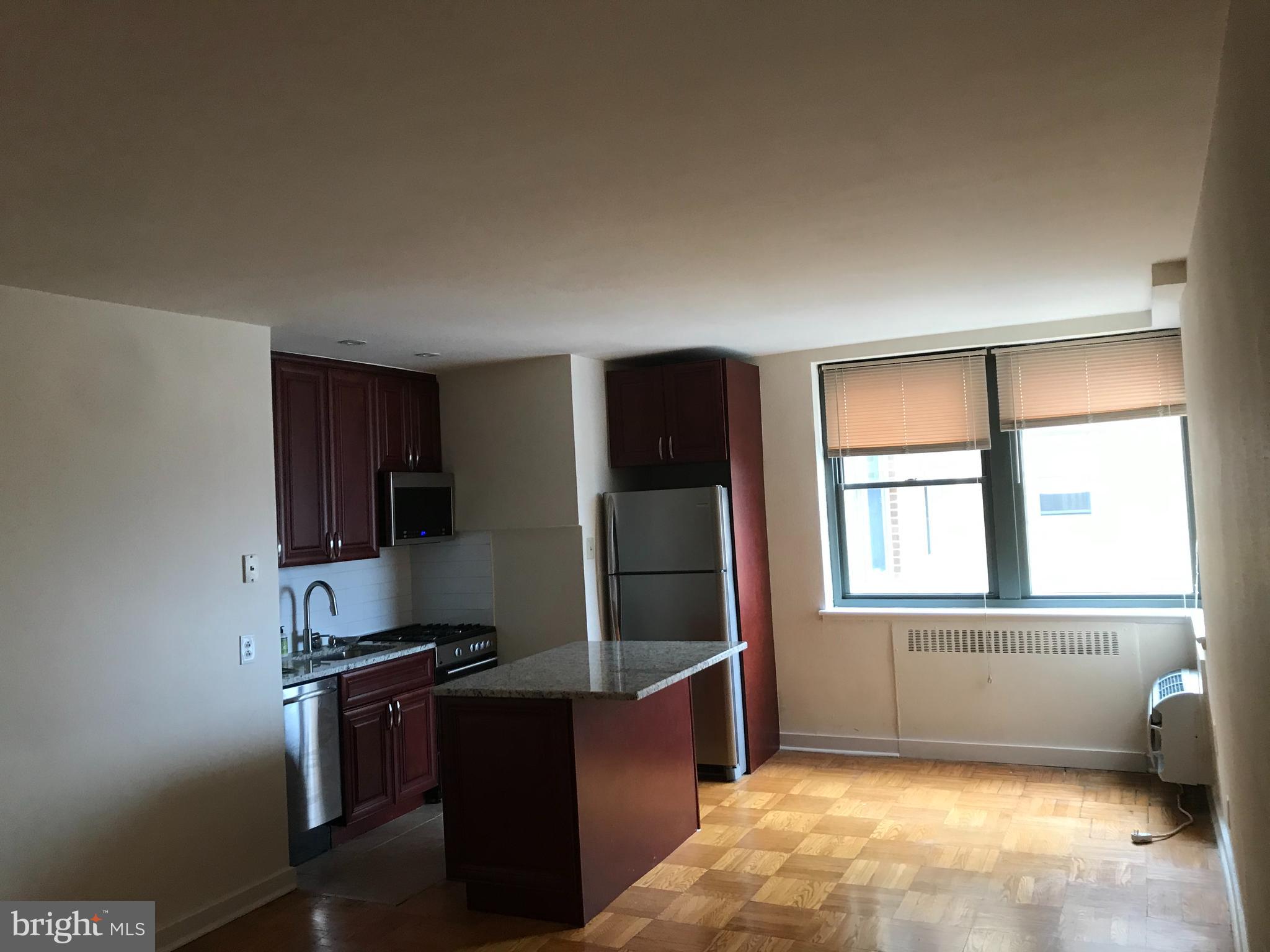 Come home to this comfortable studio at 2601 Parkway in the Art Museum Area and enjoy a newer extended kitchen featuring cherry cabinets, granite top , stainless steel appliances including a microwave, parquet hardwood floors, large closets, a ceramic tiled bathroom, an in-unit washer & dryer, and individually controlled AC & Heating. The rent includes gas cooking, water & sewer, a convenient shuttle service, state-of-the-art fitness center, and 24 hour lobby attendant. Located across from the Art Museum and Fairmount Park, this unit is close to Kelly Drive, Boat House Row, Whole Foods Market, restaurants, shopping, transportation and much more! Building charges $500 move-in /out fee.
