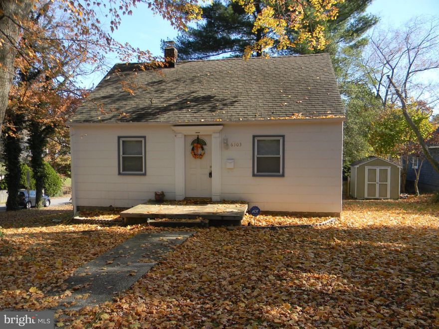 Charming 2 bedroom, 1 bath cottage on corner lot with spacious yard and hardwood floors through out. Additional sq.ft. in lower lever w/walkout to backyard patio and a laundry room area. Standup attic for storage.  Easy access to I-83 and I-695.