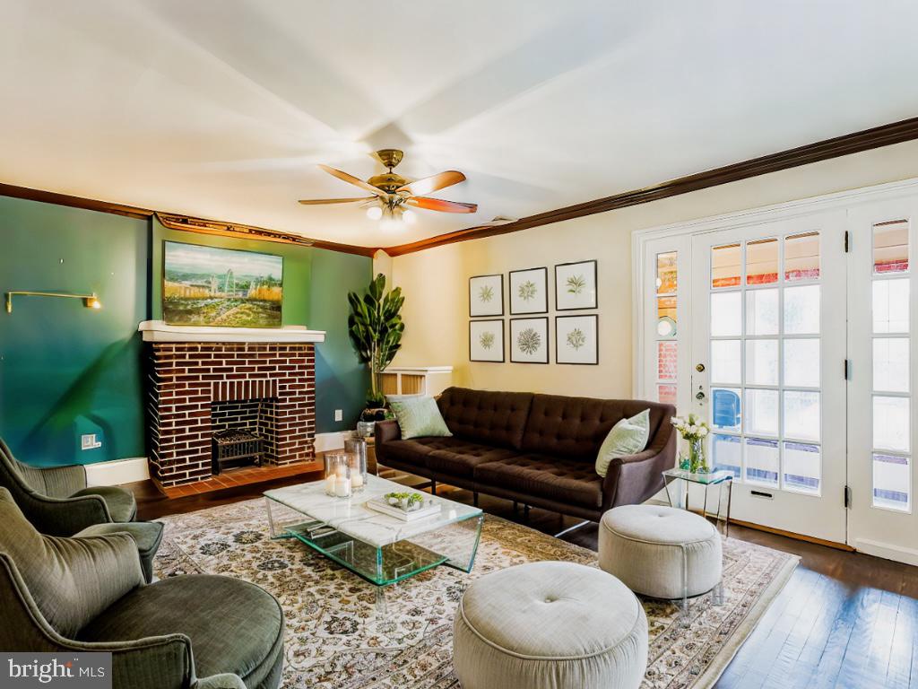 This home was staged using AI -- Priced to Sell!
Welcome to 517 Conarroe St, a beautifully updated single-family home in the desirable Roxborough area of Philadelphia. This 3-bedroom, 2-bathroom property spans 2,228 sqft and has been thoughtfully maintained and modernized, including a stunning renovation in 2024. The home features hardwood floors throughout the main level, adding classic charm, while the master bedroom offers an expansive layout with a spacious walk-in closet. One of the secondary bedrooms stands out with a striking exposed brick wall. The main level also includes a formal dining room with a gas stove, a breakfast bar for casual meals, and an extra-large family room complete with a built-in wet bar—perfect for entertaining. A cozy brick-faced electric light fireplace enhances the living space, while the oversized sunroom provides an abundance of natural light and a peaceful retreat for relaxation or gatherings. Outdoors, the fenced-in backyard ensures privacy, and the property includes a driveway for up to 8 cars, as well as a 3-car attached garage. Nestled on a quiet street in the Roxborough area and set on a generous 5,227 sqft lot, this home combines modern convenience with timeless features. Don’t miss this exceptional property!