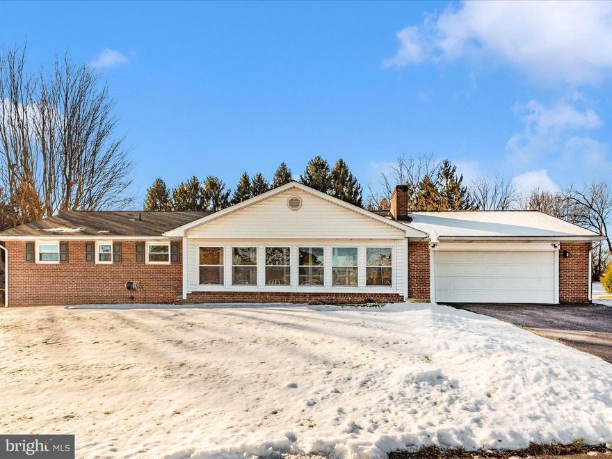 Beautiful 3-bedroom, 2-bath all Brick Rancher, sitting on a 0.36-acre lot in the Smithsburg School District. 
 Every room in this home has had updates.  For starters the kitchen has custom cabinets, quartz & butcherblock countertops, tile backsplash, all appliances, including a wine refrigerator.  The primary bath has a large soaking tub with a separate shower and a marble countertop vanity.  There's also a large walk-in closet in the primary bedroom.  And there's hardwood flooring throughout the first floor.  The lower level was finished with a large rec room, office, playroom, laundry room, complete with a washer & dryer and a mini-split heat pump for conditioning the entire lower level.  Additional updates include the roof, heat pump with oil back-up, water heater and a22'x20 ft patio off the kitchen. New oil tank installed  in January 2025.