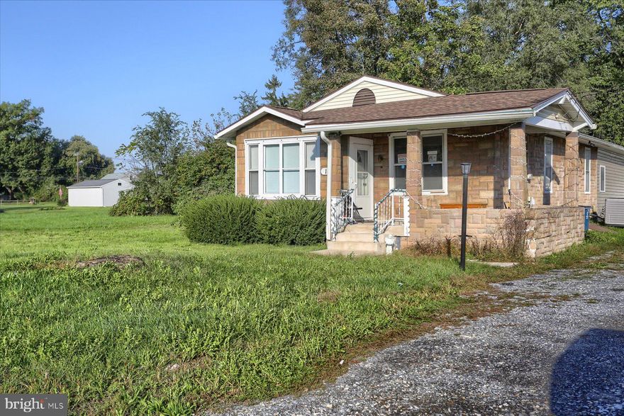 Perfect home for your own business, this is zoned residential and commercial! Enjoy one level living or new business ventures. This home features 3 bedrooms and 2 full bathrooms, a large eat in kitchen with separate formal dining room and separate laundry room. Use the shared driveway to pull around to a detached 2 car garage and enjoy a little over a quarter acre of land! The possibilities are endless. Schedule your private tour today.