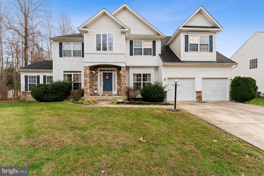 Location, location, location! This beautiful 13,332 square feet on 0.3060 acres Colonial on 3 levels two car front garage that has a grand foyer with gleaming hardwood floors.  This home features a sunny attractive Conservatory and a formal living room, dining room and a family room with cathedral ceilings with a cozy fireplace and home office to allow a comfortable workplace.  The spacious eat- in kitchen has an island with a breakfast area. The upper level has 4 bedrooms with an expansive main bedroom suite with  a Jacuzzi bath.  This home is Waiting for You! The location is a short drive to the Nation's Capital and a short commute to the State Capitol in Annapolis and within 3 miles to the Beltway for easy access to shopping malls.