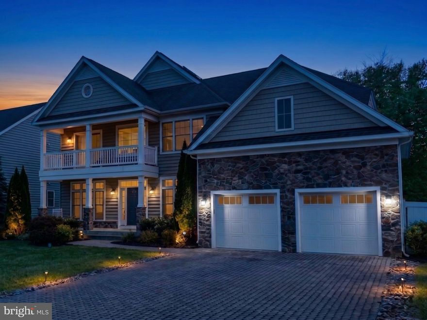 This extensively customized 5 bed, 5 1/2 bath home offers the ideal blend of style, convenience, and privacy. The property is situated on a cul-de-sac street and backs to protected woodlands, with a fenced-in back yard and heated saltwater pool. Enter the house to find an expansive kitchen outfitted with top-of-the-line KitchenAid appliances and a huge island for entertaining. Enjoy a meal in the separate dining room or grill out on the deck after a swim, then retire upstairs to the spacious primary suite, which boasts dual walk-in closets and luxury bath. Additionally, there are three full en suites on the bedroom level for guests to choose from. Adding to the convenience are the dual-load washer and dryer located just down the hall. Stop in to the private main-level study to wrap up a work day, unwind in the great room by the fireplace, or head straight down to the fully finished basement, where there's an additional bedroom, full bath, game room, outdoor access, wet bar and exercise room. Providing alternative/supplemental power is a fully-owned, 58 panel solar array that feeds into two Tesla Powerwalls with Solar Edge inverter and an energy efficient smart system. With a two-car garage, .35 acres to enjoy, and just a few minutes walk to the B & A Trail, this property is the whole package. Guard Home Warranty included!