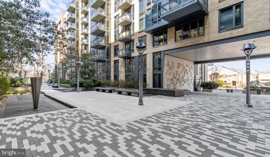 Nestled in the vibrant heart of Bethesda, Maryland, this luxury apartment complex offers an unparalleled living experience that combines modern convenience with sophisticated design. Designed to cater to the discerning tastes of urban dwellers, this property stands as a testament to luxury living, where every detail has been meticulously crafted to ensure the utmost in comfort and style.

*Exceptional Location*
Located in the sought-after Woodmont district, the apartment complex is perfectly positioned as a gateway to the best that Bethesda has to offer. Residents enjoy easy access to a plethora of amenities, including the Walter Reed National Military Medical Center, the NIH, and a variety of shopping, dining, and entertainment options. The prime location also offers convenient access to public transportation, making it easy to explore the wider metropolitan area.

*Architectural Elegance and Design*
The building's U-shaped design opens up to a beautifully landscaped courtyard, offering a seamless transition from the bustling city life to a tranquil oasis. The architecture is both richly textured and humanly scaled, creating an inviting streetscape that residents are proud to call home. A dramatic window wall façade and ground-level duplex units with front porches and planters further enhance the building's aesthetic appeal.

*Luxurious Amenities*
Residents of this apartment complex enjoy access to an array of exceptional amenities designed to enhance their lifestyle. The property boasts a large fitness center, fireside lounges, and a rooftop lounge equipped with bars, fireplaces, grilling areas, and two pools. Additionally, the convenience of having a 50,000 square foot grocery store within the building cannot be overstated. The property is also LEED Gold Certified, reflecting a commitment to environmental sustainability.

*Sophisticated Living Spaces*
The apartments themselves are a reflection of the luxury and sophistication that define the property. With a variety of floor plans, including studios, one to three-bedroom apartments, and townhomes, there is something to suit every preference. Each unit features designer finishes, stainless steel appliances, and spacious layouts that make coming home a pleasure.

*Community and Convenience*
The property is known for its friendly and helpful staff, ensuring that the needs of residents are met with professionalism and care. The well-maintained common areas and the sense of community fostered among residents make this complex more than just a place to live—it's a place to belong.

This luxury apartment complex in Bethesda, Maryland, offers an unmatched living experience for those seeking the best in urban living. With its prime location, architectural elegance, luxurious amenities, and sophisticated living spaces, it stands as a beacon of modern luxury and convenience. Realtors and renters looking for a property that combines the vibrancy of city life with the comfort of upscale living will find everything they desire and more at this premier apartment complex.

** Pricing and availability subject to change on a daily basis ** Photos are of model units ** Parking may be available for additional fee **