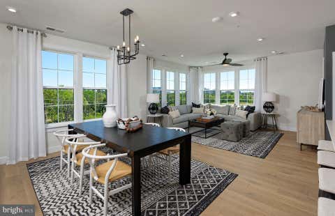 Photo of 5800 Moonstone Way #5, HAYMARKET, VA 20169 (MLS # VAPW2127094)