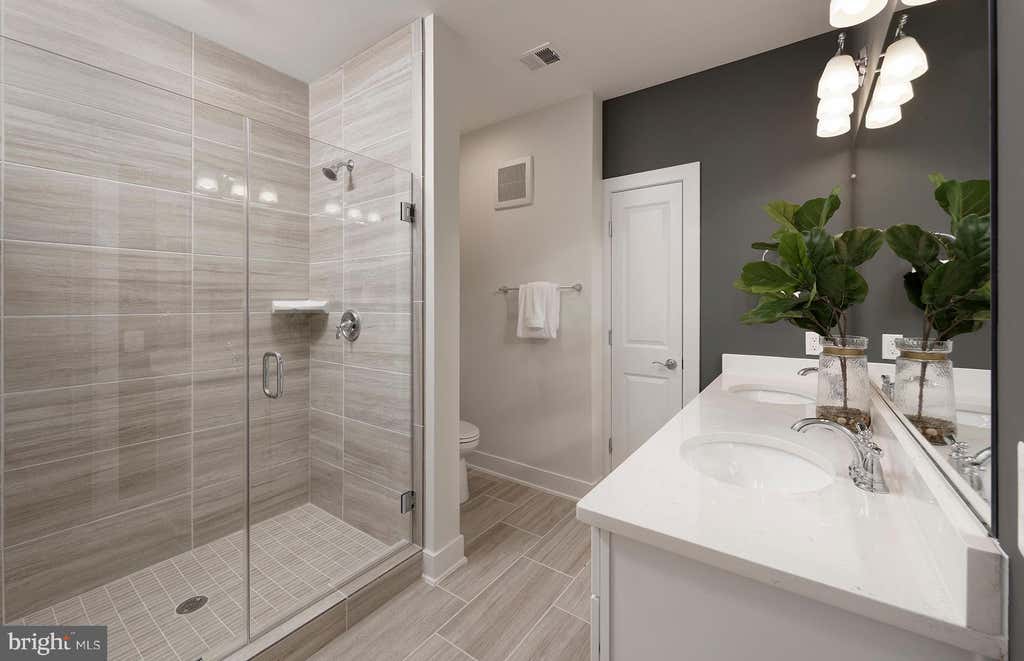 Photo of 5800 Moonstone Way #5, HAYMARKET, VA 20169 (MLS # VAPW2127094)