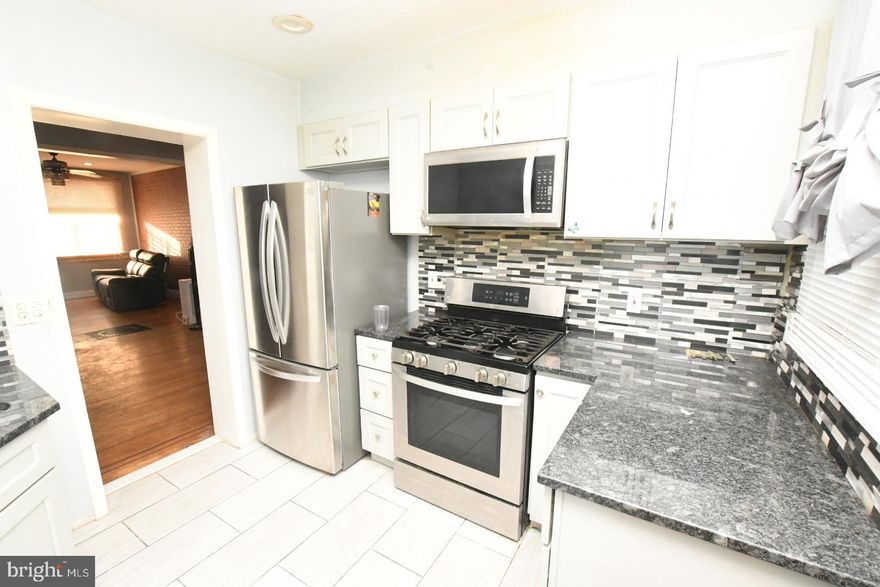 THIS PROPERTY IS NOT FOR RENT!
Desirable 2 bedroom townhome, perfect for 1st time homebuyer  or investor.  Recently updated kitchen with stainless steel appliances and updated  bathroom; original hardwood floors.  Lower level would be great family room with a little TLC.  Walking distance to public transportation and other community amenities. Property has current Baltimore City rental license. Motivated Seller!