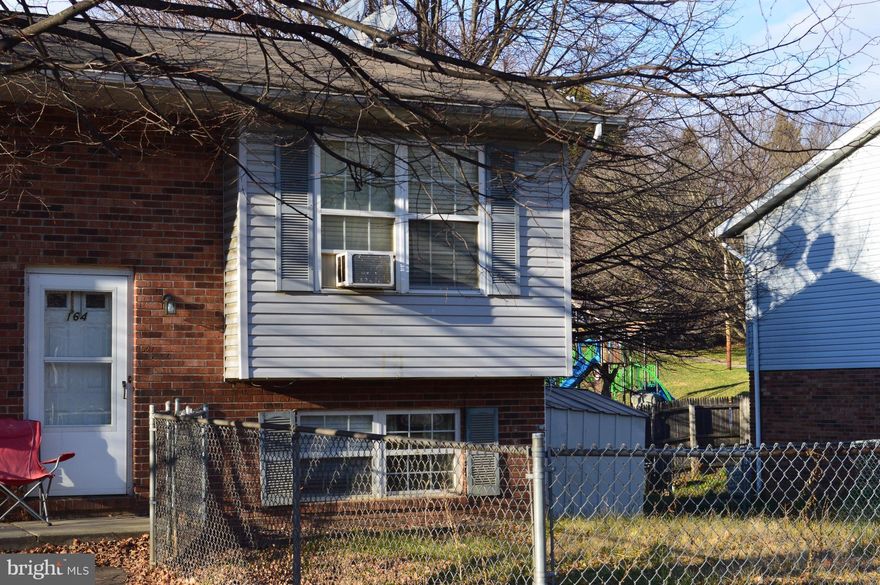 Diamond in the rough. This fabulous, roomy duplex awaits your finishing touches. 3 Bedroom 1.5 bath home is conveniently situated and offers good sized bedrooms, sunroom, fully fenced backyard and ample parking. Bring your offers today as this house may not last long.  SOLD STRICTLY AS IS .