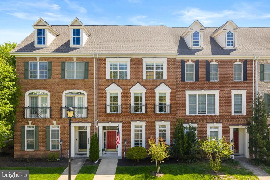 Welcome home! This beautifully appointed three-level brick-front townhome offers over 3,100 square feet of thoughtfully designed living space in the heart of Brambleton. With its classic colonial architecture, elegant finishes, and open floor plan, this home strikes the perfect balance between style, comfort, and functionality—enhanced by an extensive list of recent upgrades and improvements.
Step inside to discover a well-appointed home filled with abundant natural light, enhanced by custom touches including gorgeous hardwood floors, board and batten in the foyer, crown molding, and chair rail detailing. The main level is designed for both everyday living and entertaining, featuring a seamless flow between the living room, dining area, and spacious family room just off the kitchen. The fully renovated gourmet eat-in kitchen is the centerpiece of the home, showcasing quartz countertops, a large center island, stylish cabinetry, stainless steel appliances, and a bright breakfast space. The fireplace adds warmth and character, while updated lighting throughout the kitchen, foyer, stairways, and dining room elevates the overall ambiance.
Upstairs, the primary suite offers a private retreat with a fireplace, an ensuite bathroom featuring both a soaking tub and shower, and lots of closet space. A second bedroom on this level provides great space for a home office. This level has been beautifully updated with new hardwood flooring, including the stairs and railings, creating a cohesive and polished look.  One more level up is an open loft - perfect for a game or media room or additional living space. Two additional bedrooms and a fully renovated second full bathroom complete the third level. 
Enjoy the fully fenced outdoor space, which includes a European style brick patio and low-maintenance artificial turf, perfect for relaxing or entertaining. The home also includes a two-car attached garage equipped with a 50-amp electrical sub panel, making it workshop-ready and ideal for electric vehicle charging. 
This home has been meticulously maintained with major system upgrades, including a full HVAC replacement with electronic multi-zone dampers and a whole-house humidifier, as well as a hot water heater replacement, providing comfort and efficiency year-round.
Even more peace of mind comes with a brand-new roof, adding to the home’s long list of valuable updates. Additional improvements such as a new back door with built-in blinds, a custom fireplace mantle, an attic fan, and new garage door openers further enhance the home’s functionality.
Located within the highly desirable Brambleton community, residents enjoy an unmatched lifestyle with access to pools, fitness centers, tennis and basketball courts, playgrounds, scenic walking and biking trails, and a vibrant community center with year-round events. Everyday conveniences, including shopping, dining and personal services—are just a short walk away, along with top-tier connectivity through included high-speed internet. Zoned for Legacy Elementary, Brambleton Middle, and Independence High School, this home offers not only exceptional living space but also access to some of the area’s most sought-after schools.
This is Brambleton living at its finest—where community, convenience, and comfort come together seamlessly. Make this your home!