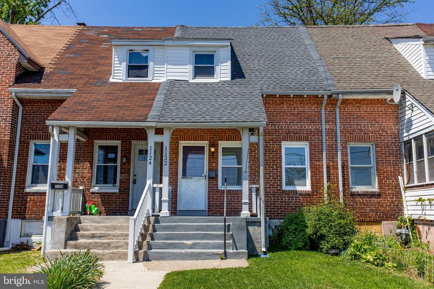 Welcome to 1122 W Ridge Road, a 2-bedroom, 1-bath rowhome in Marcus Hook. A short set of steps leads to the front entrance. Inside, the living room features two front-facing windows that bring in natural light, along with a staircase to the second level. The space flows into the kitchen, which includes granite countertops, a peninsula with seating, stainless steel appliances, and direct access to the backyard. A convenient laundry closet with a stacked washer and dryer is located just off the kitchen. Outside, the patio offers space for seating or a small table, along with a generously sized grassy yard, ideal for relaxing or outdoor use. Upstairs, the full bathroom includes tile flooring, a tub and shower combination, and a single sink vanity. Two bedrooms with carpet flooring complete the second level. Conveniently located near local restaurants, shopping, grocery stores, and more, this home also offers easy access to I-95, Philadelphia International Airport, and Center City. Don’t miss the opportunity to make 1122 W Ridge Road your new home.