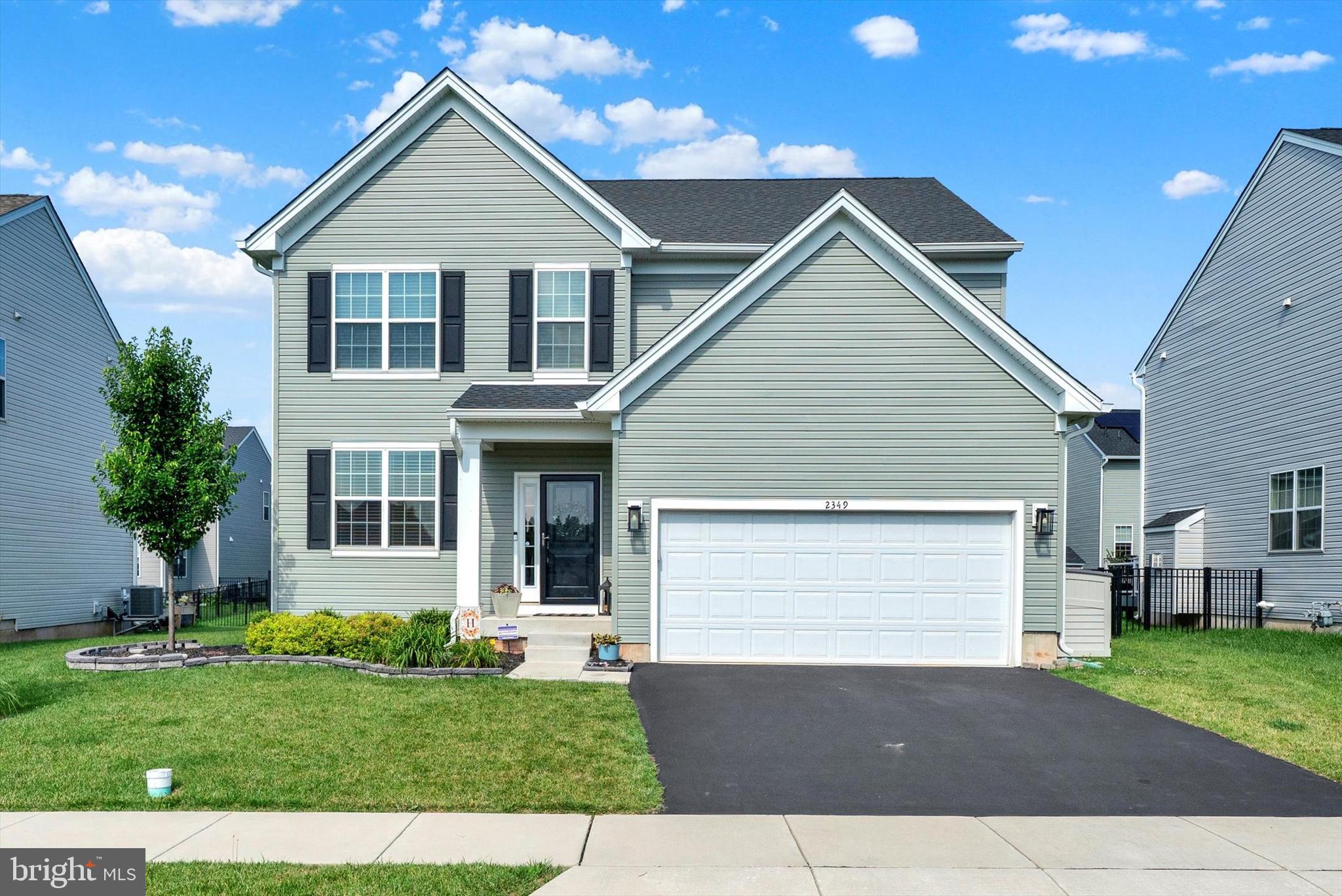 Welcome to 2349 Twin Lakes Drive, a stunning 4-bedroom, 2.5-bathroom home, just 5 years young and loaded with upgrades! From the moment you step inside, you’ll appreciate the thoughtfully designed open floor plan.
Crossing the threshold into the foyer, you'll notice the generous space for greeting guests and the open flow into the main living area. Just off the foyer to the left, you'll find a versatile front room currently used as a home office. With its flexible layout and location, it can easily be transformed into a formal living room, cozy sitting area, or reading nook to suit your lifestyle. Whether you're welcoming guests or creating a quiet retreat, this room adds both function and charm to the main level.
Step into the heart of the home to find newer (2024) wood plank flooring flowing throughout the spacious first floor, complementing the open-concept layout that seamlessly connects the living, dining, and kitchen areas—ideal for both everyday living and entertaining. A center island in the kitchen adds counter and storage space, while serving as a hub for hosting family and friends. Stylish stainless steel appliances and granite countertops merge form and function, while a separate pantry provides additional space to stash all your kitchen essentials.
A beautifully upgraded wood staircase leads to the second floor, where you’ll find four generous bedrooms, including a serene primary suite with a private bath and ample closet space. A spacious hall bath serves the three remaining bedrooms.
Downstairs, the fully finished basement provides the ultimate flex space with a large recreation area and a dedicated exercise room—ideal for work, play, and wellness.
Step outside to enjoy the fenced rear yard with a stylish paver patio, offering the perfect space for outdoor dining, relaxing, or entertaining.
Additional features include an upgraded AC system for enhanced comfort and a water softener.
Located in a desirable, newer community, this home combines modern finishes, functional spaces, and peace of mind with its recent construction. Don’t miss your chance to own this like-new home with all the extras!