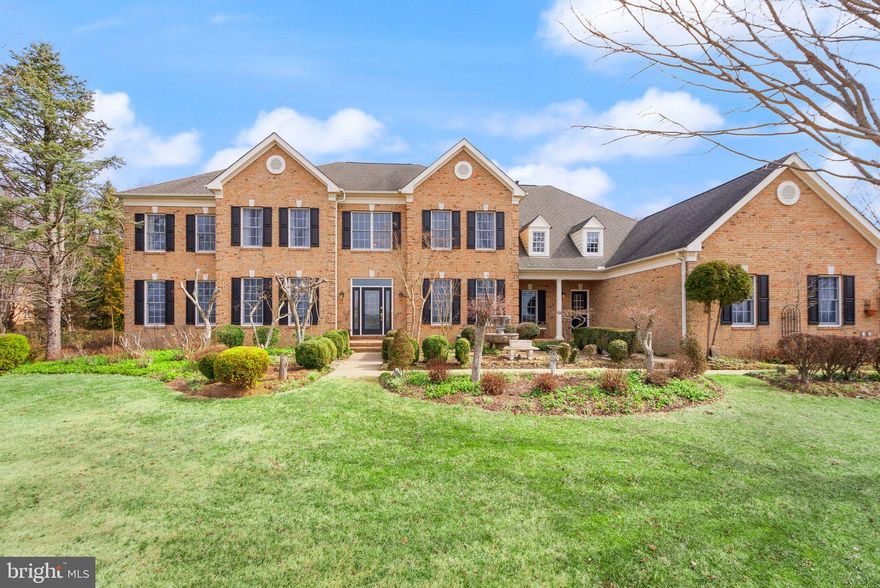 ONE OF THE MOST BEAUTIFUL & PRIVATE LOTS IN SHENSTONE! Experience luxury living at its finest in this stunning three-sided brick home, majestically perched atop a picturesque 3+ acre lot in the highly sought-after Shenstone Farm neighborhood. This elegant 'Coventry' model by Toll Brothers with over 5500 square feet of elegant living space on the main and upper level offers breathtaking panoramic views of rolling hills and a wealth of sophisticated features designed for comfort and gracious living. The home welcomes you with a light filled two-story foyer with marble flooring that sets the tone for the elegance within as well as handsome trim and moulding work and tasteful paint decor. Enjoy a separate dining room perfect for entertaining, a formal living room, and a spacious side conservatory with access to the main level office and French doors leading to the expansive deck. Gather in the inviting and expanded family room, featuring an upgraded wood stove, ideal for cozy evenings. The upgraded Palladian kitchen is a chef’s dream, with expanded cabinetry, a center island, and new appliances including a new commercial-grade range with stainless steel hood, and a large breakfast room overlooking a serene zen garden. The home additionally features a pantry, mudroom, and a three-car side garage.  ** A second rear staircase adds convenience to the upper level. Boasting a total of FIVE BEDROOMS ON THE UPPER LEVEL with all with hardwood floors, the owner’s suite is a private retreat with a tray ceiling, separate sitting room with a gas fireplace, large walk-in closet, and an expanded bath layout with dual vanities, a large shower with glass door, and a soaking tub. The spacious secondary bedrooms all with private full baths provide ample space and comfort for family and guests.  ** The walk-up lower level features the beginnings of framing and a fully finished bath, ready for your personal touch.  

Sited on a picture perfect three acre lot, the property features a long elegant driveway, beautiful trees, a well loved garden with beautiful perennials and ornamental shrubbery, as well as a tranquil Koi pond offering you peace and complete solitude. The low-maintenance composite deck spans the length of the house, and the leveled, private backyard is perfect for any outdoor projects and relaxation. Enjoy a quiet, peaceful setting with rolling hill views, just minutes to downtown Leesburg, major commuter roads, shopping, restaurants, and Loudoun County's renowned wineries, breweries, and quaint shops. 

Welcome to your dream home in Shenstone Farm, where elegance, comfort, and breathtaking views await you every day!