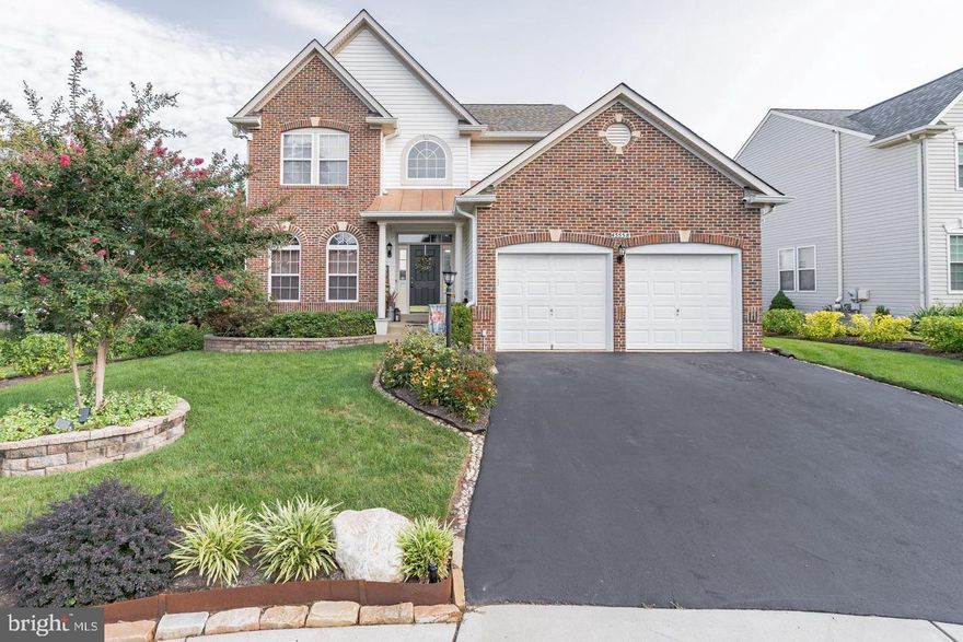 Welcome home to this lovely sun-filled house on a cul-de-sac! Featuring high ceilings, hardwood floors, an open layout, and a dual staircase, this home is bright and spacious. The main floor includes a living and dining room combo, an updated kitchen with granite countertops, stainless steel appliances (2021), an island, and an eat-in area overlooking the family room with built-ins and a gas fireplace. The laundry and mudroom area connects to the 2-car garage. The deck is perfect for BBQs, and the beautifully landscaped yard adds a picturesque touch.

Upstairs, you'll find 4 bedrooms and 2 bathrooms, including a master ensuite with new flooring, faucets, a soaking tub, dual sinks, a stand-up shower, and a walk-in closet. The bright walk-out basement features a den/office, an updated full bathroom, and ample storage space.

Additional features: roof replaced (November 2020), sliding glass door to deck (2019), updated WiFi-enabled irrigation system with rain sensors (2018). The community offers a very active HOA with social events, tennis courts, a swimming pool, and walking and biking trails. Conveniently located near Route 28, the Dulles Toll Road, Route 7, Dulles Town Center, One Loudoun, Costco, Wegmans, and the Silver Line.