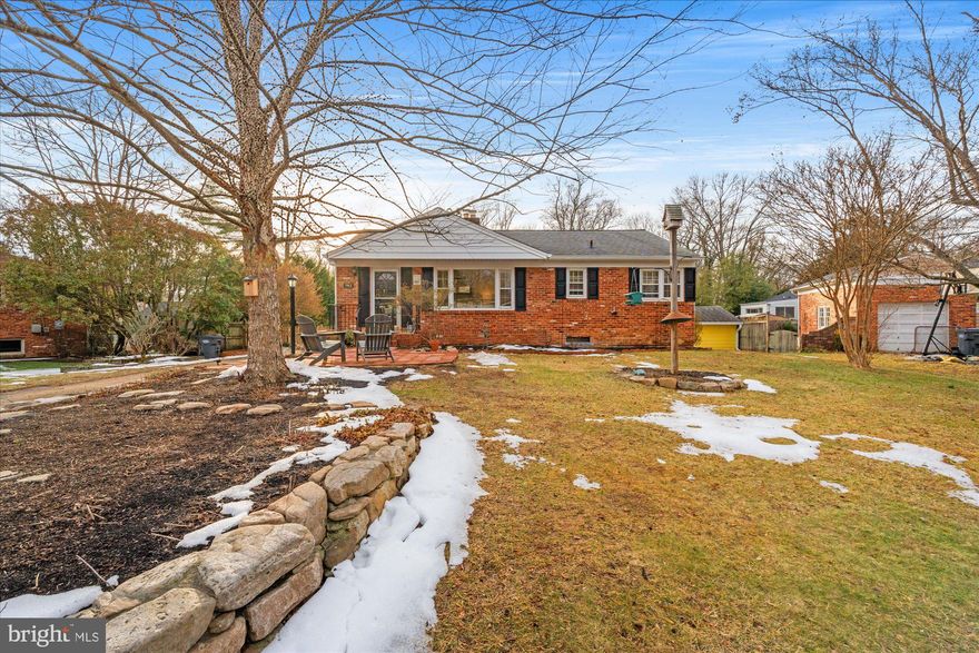 Welcome to this beautifully maintained 3-bedroom, 2-bath home nestled in the heart of beloved Hollin Hall Village, where timeless charm meets everyday comfort. Freshly painted interiors and an updated kitchen create a bright, inviting atmosphere, while the sun-drenched sunroom with cozy fireplace offers the perfect place to relax, read, or gather with friends in every season.

The finished lower level expands the living space with a spacious family room, dedicated office area ideal for working from home, a workshop for hobbies or projects, and generous storage throughout—designed to support both daily living and long-term organization.

Step outside to a large, level backyard that feels like a private retreat, complete with a peaceful fish pond and plenty of room for entertaining, gardening, or play. Located just moments from Hollin Hall Village shops, the GW Parkway, Old Town Alexandria, and Washington, DC, this home offers the perfect balance of community charm and commuter convenience.