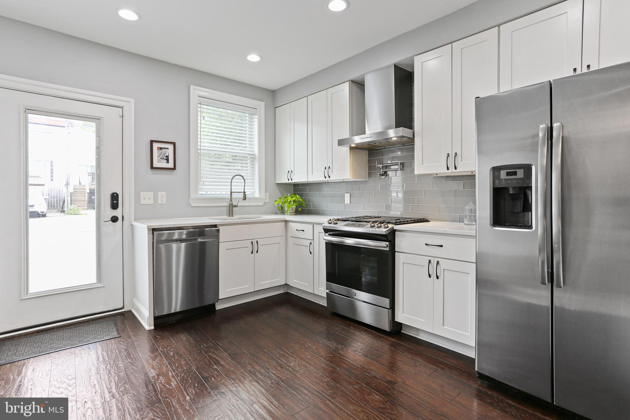 Welcome to 1515 Light Street, a charming residence nestled in Baltimore's Federal Hill neighborhood, with over five years left on its CHAP tax credit, saving you over $30,000! Our favorite features of this home include a 2+ car parking pad, wet bar on the 3rd floor, 3 bedrooms and 3.5 bathrooms all above grade, and tiered rooftop decks!
As you step inside, you'll find gleaming hardwood floors, exposed brick, and plenty of natural light, creating a warm and welcoming atmosphere. The living room flows seamlessly into the dining area, great for seating lots of dinner guests! The kitchen boasts quartz countertops, stainless steel appliances, a range hood, and breakfast bar, perfect for cooking and entertaining. This floor also includes a half bathroom, coat closet, and pantry, plus access to your oversized parking pad.
The primary bedroom boasts dual closets, built-in dresser drawers, and an en-suite bathroom for added convenience. The second bedroom on this level also has its own en-suite bathroom! Continue upstairs for the third bedroom, third full bathroom, laundry, plus an open entertaining space with wet bar and mini-fridge, adding to the convenience of entertaining outdoors!
Outside, there's a beautiful deck with adjacent greenery, ideal for relaxing or enjoying a meal outdoors. Head upstairs for even more rooftop space and enjoy awesome city views! The unfinished basement is great for extra storage space.
Located near so many restaurants, shops, parks, and I-95, this home offers easy access to everything Federal Hill and Baltimore have to offer.
Don't miss out on the opportunity to make 1515 Light Street your new home. Schedule a tour today!