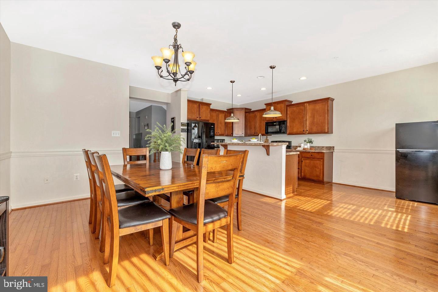 MOVE IN TODAY! Come see this large, almost 3300 sqft brick front town home in highly desirable Ballenger Creek in Frederick! Offering 3 very spacious bedrooms and 3.5 bathrooms, plus a rare main level office/extra bedroom with a closet, this home is a must see! Tall 9ft ceilings, open layout, lots of windows, walk in closets, plenty of extra storage area throughout, a rare walk in pantry in the kitchen are just some of the standout features in this home! Gourmet kitchen with granite counter tops and room for a breakfast nook overlooking the lush open, common area in the backyard. Tray ceiling in the primary bedroom with an en-suite bathroom and large walk in closet. The other 2 bedrooms are also spacious with walk in closet space and another full bathroom. The laundry room is conveniently located on the upper level. The basement rec room leads to the lovely backyard. 3rd Full bathroom plus 3 closets for storage and garage access from this level! Generously sized, 2 car front loaded garage. There are many amenities to enjoy including the Club House, Common Grounds, Community Center, Exercise Room, Jog/Walk Path, Party Room, Pool - Outdoor, Soccer Field, Swimming Pool, Tot Lots/Playground! Excellent location close to major commuter routes, plenty of shopping and dining options. Minutes to historic downtown Frederick. No more than 2 incomes; good credit is required. Longer lease is preferred. The home is available for immediate occupancy!