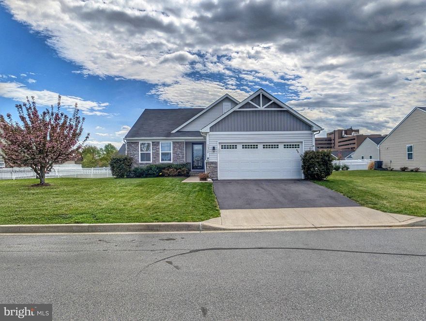 Step into modern comfort with this 2019-built, 3-bedroom, 2-bath home, perfectly designed for single-floor living. The open, thoughtfully planned layout flows seamlessly from the modern kitchen to the living and dining areas, creating an inviting space for both daily life and entertaining.

Retreat to the deck overlooking your private backyard, or take advantage of the full, unfinished basement—ideal for a home gym, workshop, or additional storage. Located in a quiet, well-established Martinsburg neighborhood, this residence offers the perfect balance of tranquility and accessibility, just minutes from I-81 and only 1.5 hours from Washington, D.C., and Baltimore.

Embrace a lifestyle rich in history and culture, with Harpers Ferry, Antietam National Battlefield, and Shenandoah National Park within a short drive providing endless opportunities for weekend exploration. This home combines modern elegance, practical design, and a premier location for those seeking both convenience and charm.