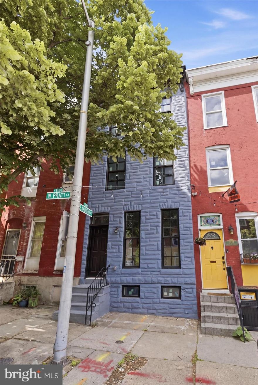 Welcome Home!!!!  This stunning Baltimore City modern row home, provides warmth and all the we are home feels! The main level has beautiful exposed brick walls and paired with wood floors that create a warm, inviting atmosphere. Updated recessed lighting throughout enhances the spacious open layout, perfect for comfortable everyday living and entertaining. The kitchen features sleek stainless steel appliances, ample cabinet space, and a cozy nook ideal for dining. This home boasts with four bedrooms, three full bathrooms, and one half bathroom, provides plenty of room to relax and unwind. The bathrooms are thoughtfully updated with modern finishes. Two upper levels provide flexibility for work, recreation, or guest accommodations, offering endless possibilities. This home provides city living  in Baltimore City location,  but with a touch of luxury that you cannot deny. Come see this home today before it is gone!