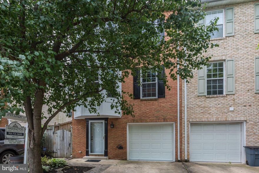 This modern & bright Del Ray end unit townhouse is located close to "The Avenue", parks, restaurants, shopping & more! 3BRs on upper level with two renovated full baths. Fabulous updated kitchen with butlers pantry opens to private patio. Gorgeous bamboo floors. Walkout lower level with attached garage - space for additional car in driveway. Newer HVAC and tankless hot water heater. Don't miss it!