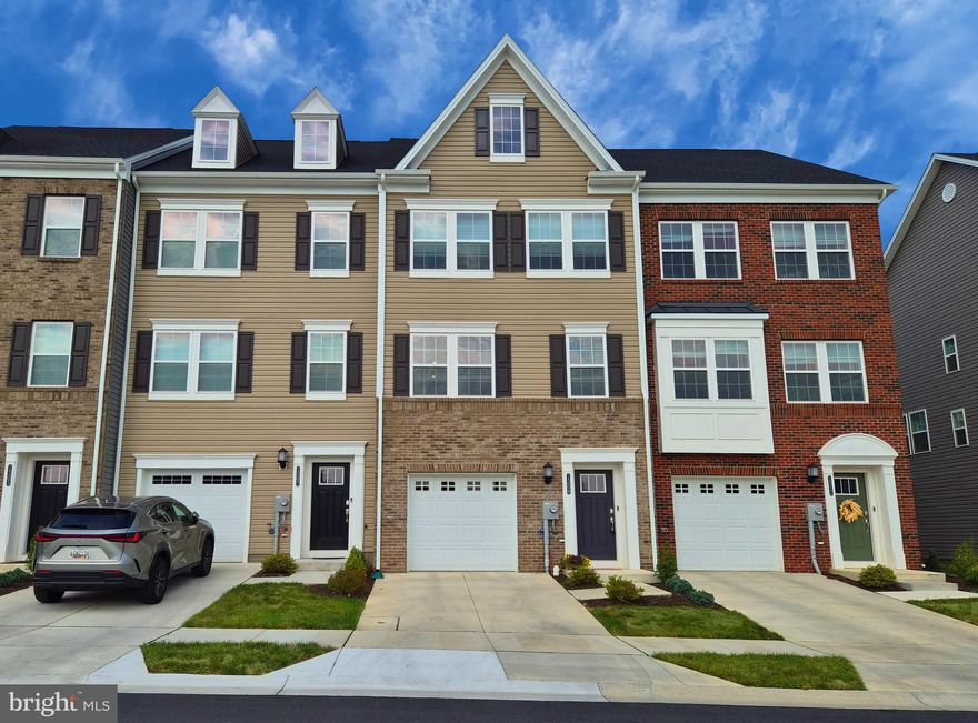 Rent in the New and Sought after Sycamore Ridge community!  Don't miss this brand new gorgeous 3-level townhome with 3 bedrooms, 3.5 bathrooms, upgraded kitchen and beautiful Trex Deck.   The entry level has a rec room with walk out to the back yard and a full bathroom for versatile use.   The main level boasts a bright and inviting kitchen with Oversized island, soft-close cabinets,  living and dining spaces with large windows and a half bath for your convenience.  Upstairs you will find a large owners suite with ensuite bath and walk in closet plus 2 secondary bedrooms, another full bathroom and laundry.  Tall ceilings with recessed lighting throughout makes the space bright and spacious.   Sycamore Ridge  Community maintains picnic tables, tot lot, trails and a park.  Close to 70 and 15 for commuting. One year minimum lease.  Available November 1, 2025.  Apply online with Rent Spree.
