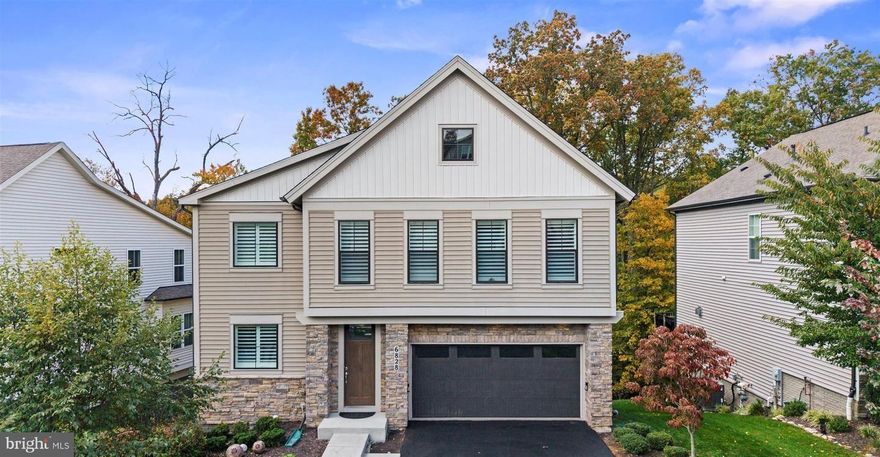 **MORE DETAILS AND PROFESSIONAL PHOTOS 12/19    Nestled in the prestigious Aspen North at Lake Linganore, this exquisite Colonial-Contemporary residence embodies the perfect blend of luxury and comfort. Built in 2017, this stunning home spans an impressive 4,308 square feet, offering ample space for both relaxation and entertainment. As you step inside, you are greeted by an inviting ambiance highlighted by a cozy fireplace, perfect for creating cherished memories on cool evenings. The elegant stone exterior exudes timeless charm, while the thoughtfully designed layout ensures a seamless flow throughout the living spaces. The property features an attached front-entry garage with space for two vehicles, ensuring convenience and ease. Step outside to discover the community's luxurious amenities, including a sparkling pool that beckons on warm summer days. The surrounding landscape offers a serene backdrop, perfect for leisurely strolls or enjoying the tranquility of nature. This residence is not just a home; it's a lifestyle. Experience the perfect balance of elegance and comfort in a community that values quality living. Embrace the opportunity to make this exceptional property your own and enjoy the exclusive lifestyle it offers.