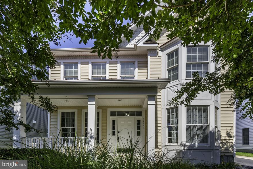 Price Reduction at 12167 Snug Harbour Rd, Berlin, MD – Tucked within the sought-after community of The Landings at Bayside, this beautifully maintained home offers spacious living, resort-style amenities, and unbeatable access to everything the Eastern Shore has to offer. A welcoming front porch with a cozy sitting area sets the tone, while the rear yard features a private patio—perfect for grilling and outdoor entertaining. Inside, the first floor boasts a formal living room and dining room, an open-concept kitchen with breakfast area, a family room with fireplace, and a convenient guest half bath. The second level includes a luxurious primary suite with soaking tub, double vanity, separate shower, plus three additional bedrooms—and a full hall bath. The third floor provides a large bonus space ideal for a fifth bedroom, playroom, game room, or guest suite, complete with a full bathroom. Enjoy the convenience of a detached garage and direct access to a community pathway that leads just a short distance to the pool and clubhouse. With low taxes, affordable HOA fees, and short-term rentals allowed, this home is perfect as a primary residence, vacation getaway, or investment property. The Landings at Bayside offers an exceptional lifestyle with indoor and outdoor heated pools, fitness center, game room, tennis and basketball courts, crabbing pier, stocked fishing pond, kayak launch, nature trails, tot playground, and two community docks with breathtaking bay views. Lawn care and trash service are included, making life here as easy as it is enjoyable.