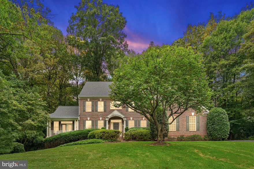 This exquisite colonial-style home offers 5 bedrooms, 4.5 baths, and over 5,000 finished square feet on a beautifully landscaped 0.83-acre lot in the highly desirable community of Wynbern. The main level showcases gleaming hardwood floors, detailed trim work, a formal dining room, a refined living room with stone fireplace, and a sun-filled family room. At the heart of the home, the gourmet kitchen boasts rich cabinetry, quartz countertops, stainless steel appliances, double ovens, a spacious island, and open breakfast space. A private office  with built-ins, and a half bath complete the main level. Upstairs, the expansive primary suite offers a serene retreat with a tray ceiling, sitting area, and dual walk-in closets. The spa-inspired bath features a soaking tub, frameless glass shower, and dual vanities. The additional 3 bedrooms provide en-suite or well appointed hallway bath access. Upstairs laundry is conveniently located for ease of access. The finished walk-out lower level is perfect for entertaining, featuring a multi function room, bedroom, full bath, and large storage areas.  Step outside to a private backyard oasis complete with an expansive deck and mature landscaping. This home also features a 3-car side loading garage with built in storage and epoxy flooring.  Short drive to shops and restaurants.