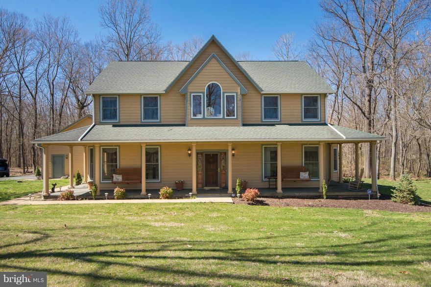 Spring foliage makes for a beautiful portrait on this wonderful farm style home snuggled in the woods outside Historic Shepherdstown, close to the Potomac River and town amenities. All the features you look for are here. Welcome home!.You will want to spend ALL your time enjoying the inside and outside relaxation and enjoyment areas. A one of a kind home awaits you!