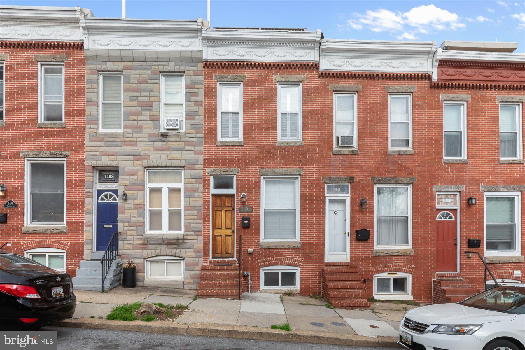 Welcome to this beautifully updated 2 bed, 2 bath townhome in the heart of Riverside, offering the perfect blend of historic charm and modern comfort. Located just a short walk to Harborview Marina, McHenry Row, Cross Street Market, and all the vibrant attractions Federal Hill has to offer, this home includes the convenience of a private parking pad added in 2018. Renovated in 2011, the home boasts exposed brick, solid wood interior doors, and recessed lighting. The kitchen is outfitted with solid wood cabinets, granite countertops and stainless steel appliances. 2018 refrigerator, 2023 microwave, and 2024 dishwasher.
The semi-finished basement offers flexible bonus space or home gym potential. (Note: basement has been water- and mold-proofed with foundation sealant (LiquidRubber), MasterSeal/Thoroseal wall coatings, and mildew-resistant Loxon masonry paint.)
Upstairs, the primary suite features custom built-ins, an updated ensuite bath with a rain shower (about 6 months left warranty on labor and lifetime for materials), and a convenient stackable washer/dryer in the hallway. The second floor features original hardwood flooring, adding warmth and charm.
Enjoy outdoor living at its finest on the composite rooftop deck (2020) with spectacular views of the Domino Sugar sign and Fourth of July fireworks.
Rest easy knowing major systems are updated: gas HVAC (2017), gas water heater (2011), new PVC sewer line (2018), and the roof was coated and sealed in 2020. This turn-key home offers timeless style and thoughtful updates in one of Baltimore’s most desirable neighborhoods! Don’t wait, schedule your private home tour today!!"