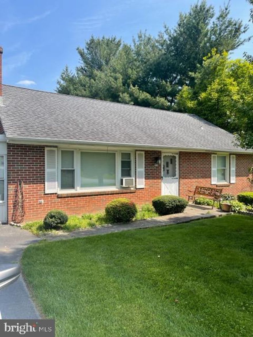 This very well maintained solid brick rancher/rambler is ready for its new owner. It's a spacious 2 bedroom 2 full bath rancher with  finished attic space and a fully finished basement, the attic and basement space allow for two additional bedrooms.  Hardwood floors on the main level, and a fireplace in the living room. This move in ready home sit on a large beautifully landscaped lot with plenty of room for gardening.