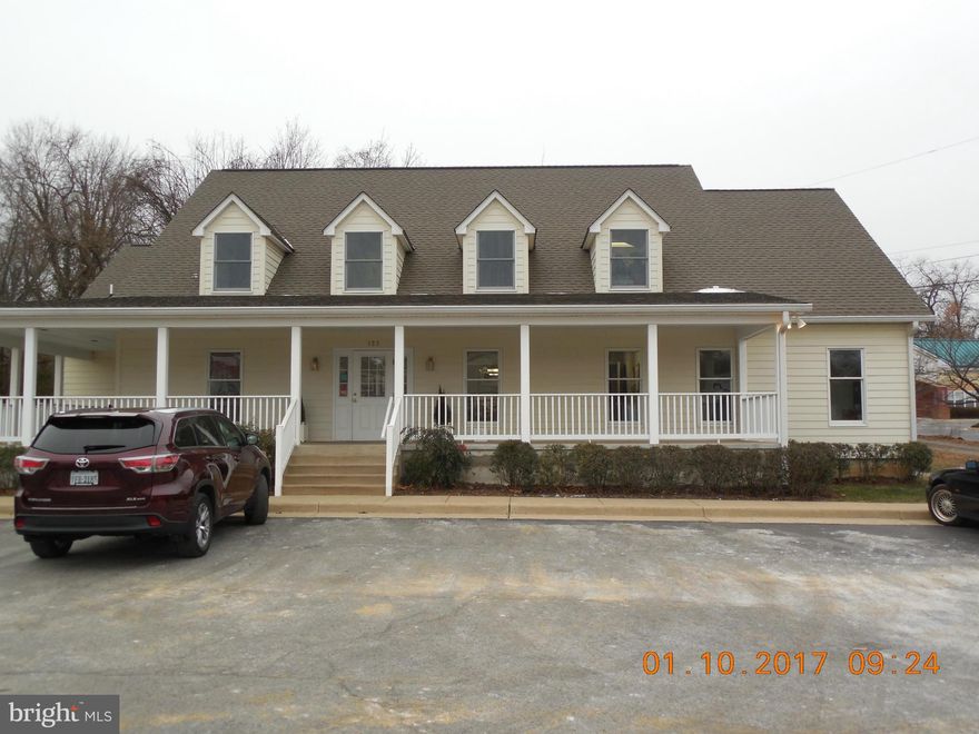 Excellent location on busy Shirley Ave. Large office with plenty of file storage plus a break room.