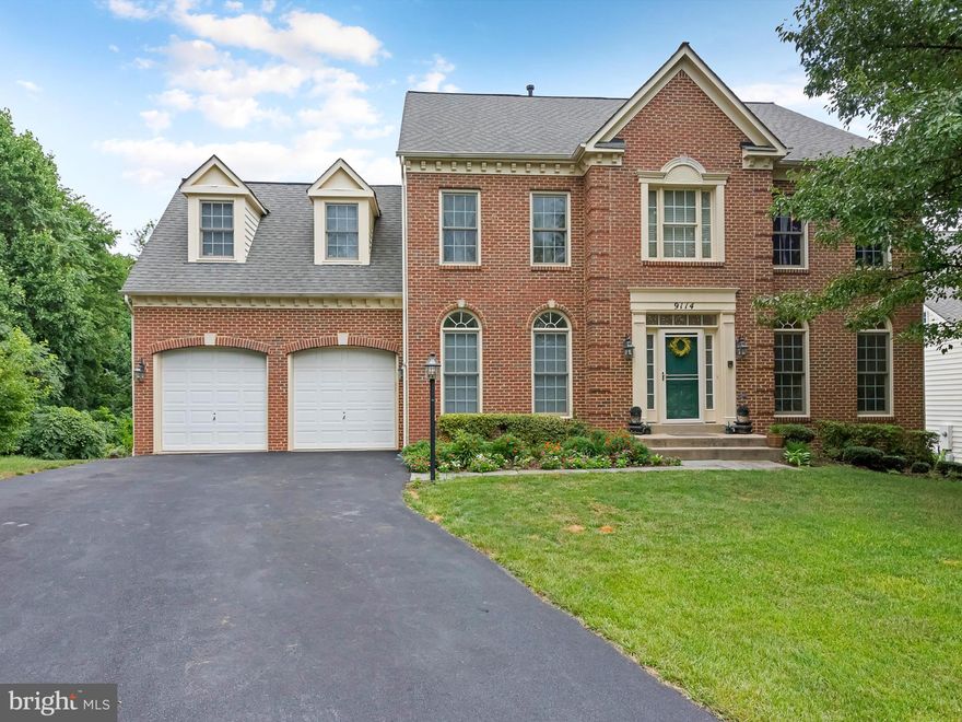 Fabulous brick front home: walk-out basement leads to flat yard backing to woods. Enjoy spacious deck & patio below. Gourmet kitchen: loads of cabinets, island w/ gas cooktop, all new stainless, built-in desk, wet bar. Hardwd throughout. MBR suite: sitting area, lux bath w/ soaking tub, dual sinks, huge walk-in closet. Basement in-law suite: kitchen, bedroom, bath, rec area. fireplace, bonus room.