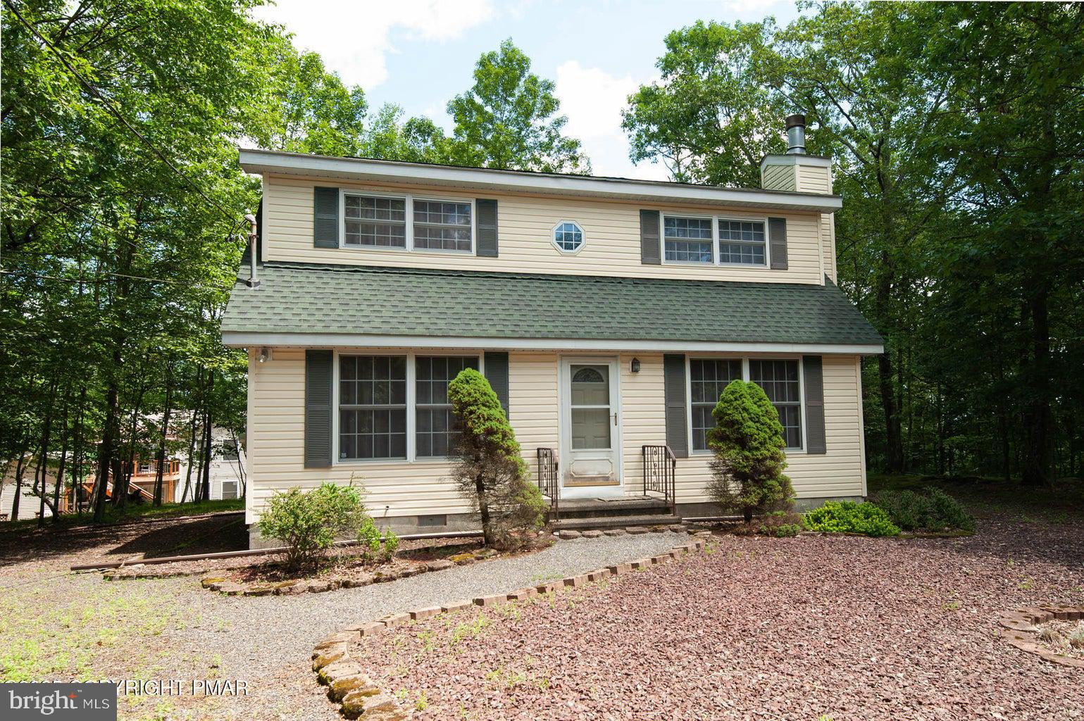 Affordable and ready for your next project and vision!! 3 Bedroom 2 Bath Colonial with wood burning fireplace in Desirable 5 STAR AMENITY FILLED SAW CREEK ESTATES in the Middle Smithfield Township portion and on a Cul De Sac!! Wow! Newer Roof and Low Taxes! Opportunity Knocks!